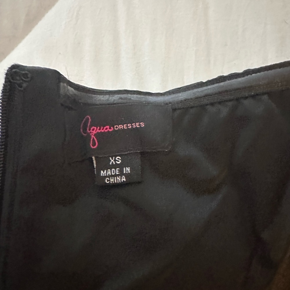 Black cocktail dress. Strapless. Size Xs. Great quality